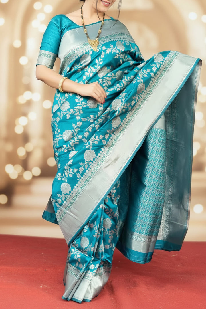 Model wearing teal Banarasi silk saree - full length front view showing silver zari jaal