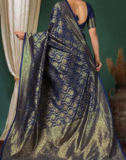 Model wearing royal blue Banarasi silk saree - back view showing heavily woven gold zari pallu