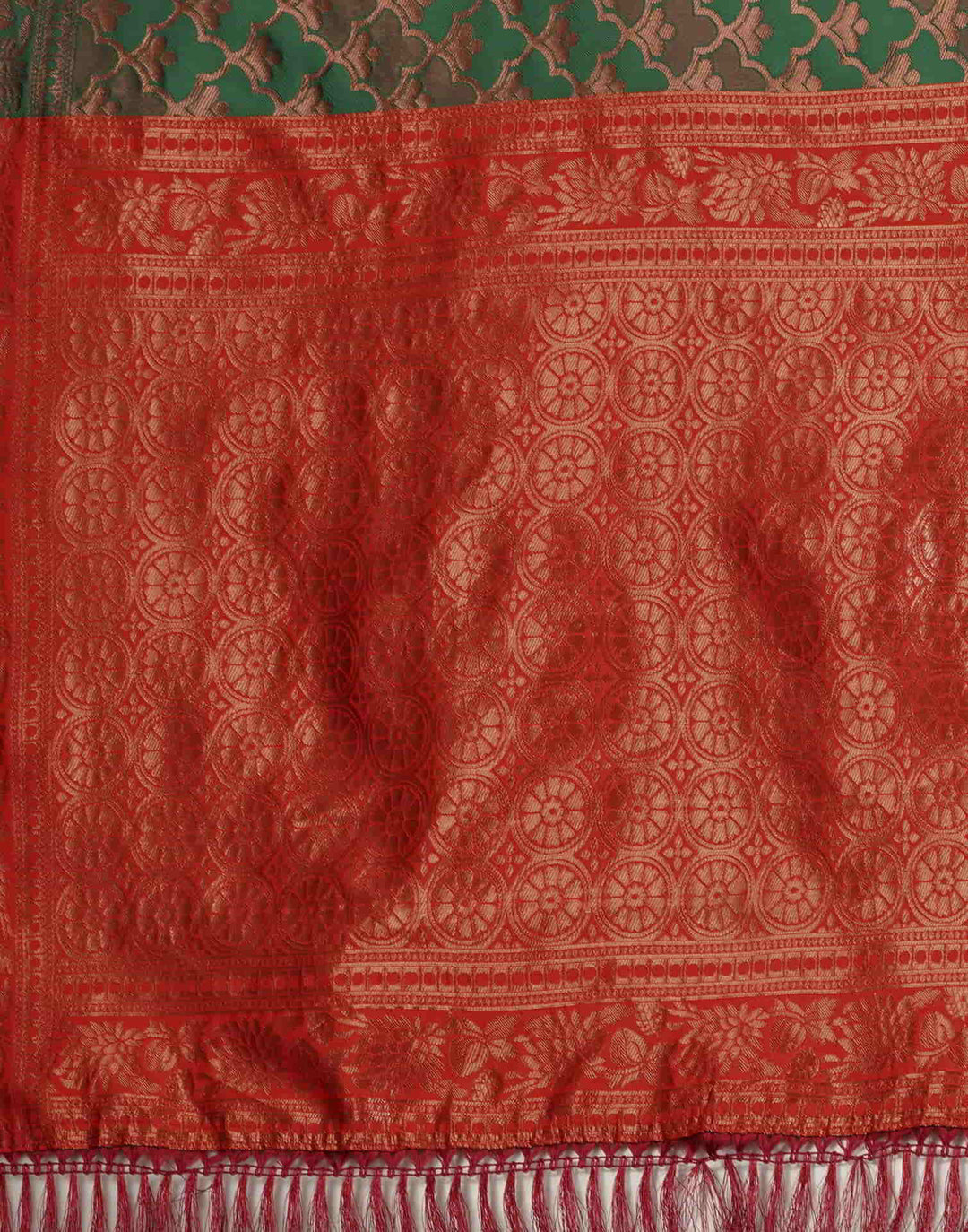 Full front view of model in forest green Banarasi silk saree with copper zari shell jaal and red contrast pallu drape