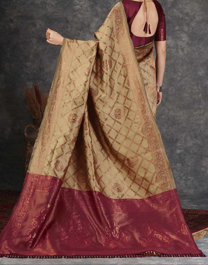 Blouse flat-lay of maroon silk blouse showing round neck and copper zari floral sleeve border design