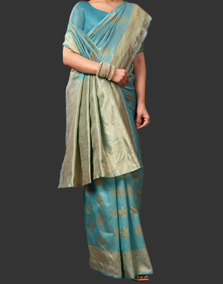 Full front view of model in teal blue Banarasi silk saree