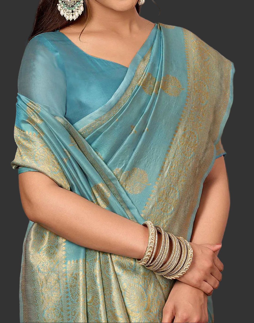 Three-quarter view with chandelier earrings