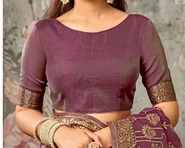 Blouse flat-lay of wine purple silk blouse showing round neck and antique gold zari floral sleeve border design