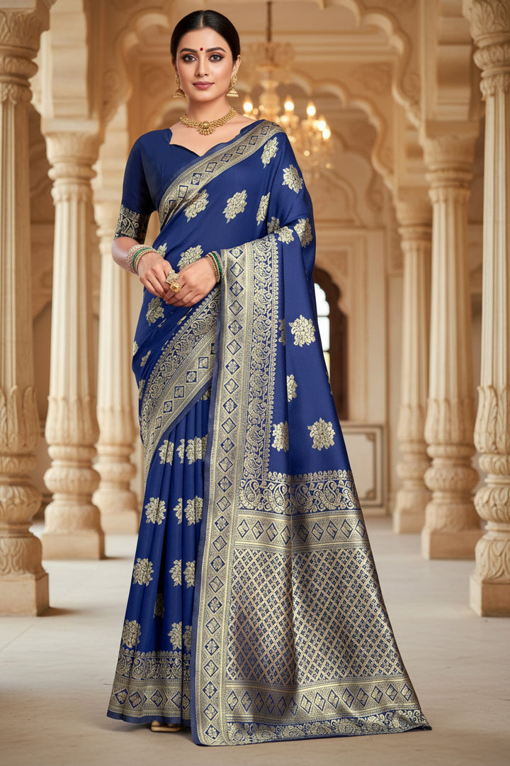 Full front view of model in royal blue Banarasi silk saree with gold zari floral buttas