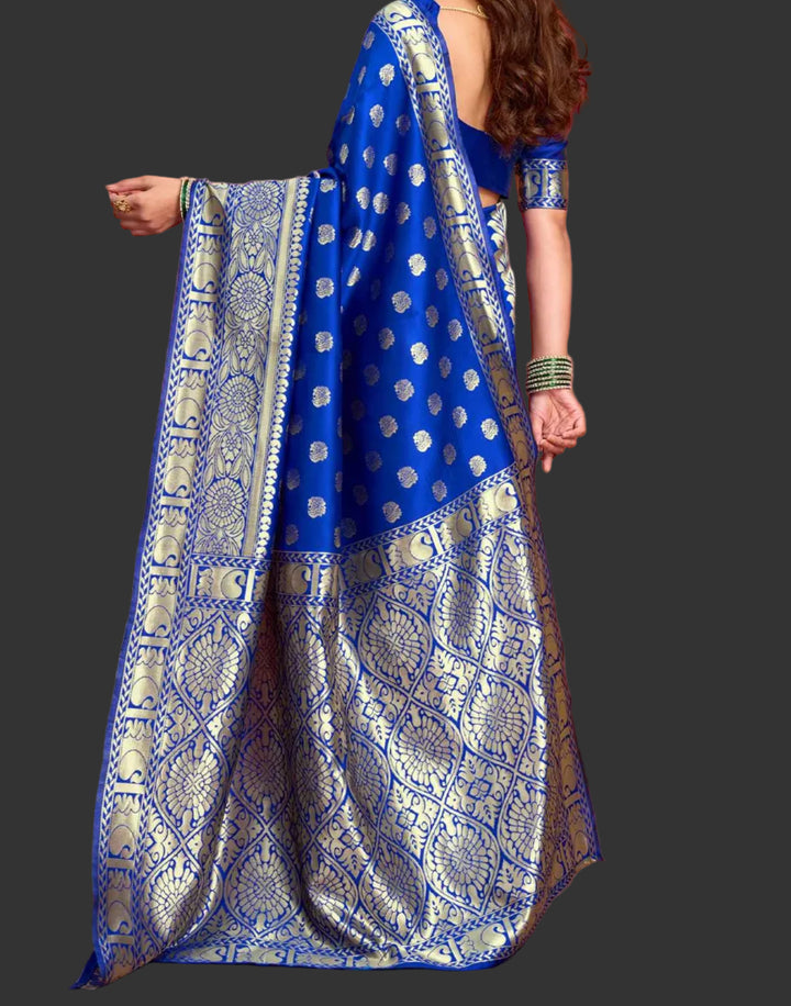 Full front view of model in royal blue Banarasi silk saree with gold zari shell buttas and antique gold border