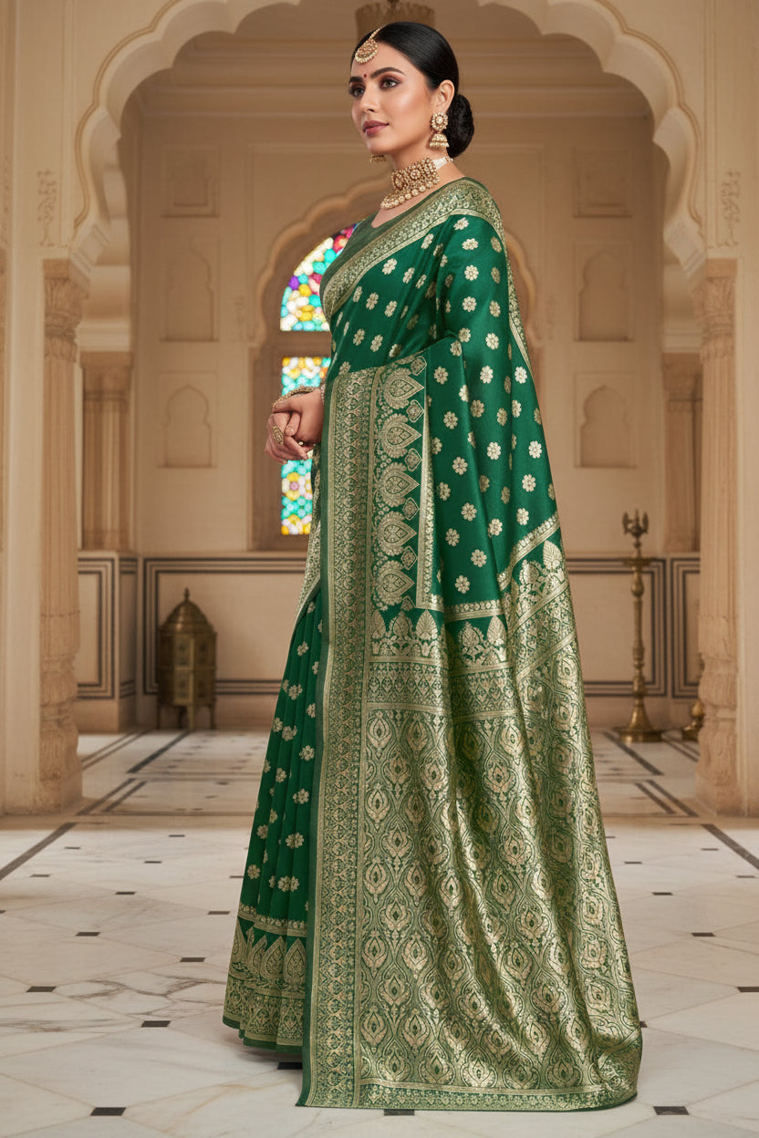 Back view of model in bottle green Banarasi silk saree showing dense gold zari diamond jaal pallu and open back blouse