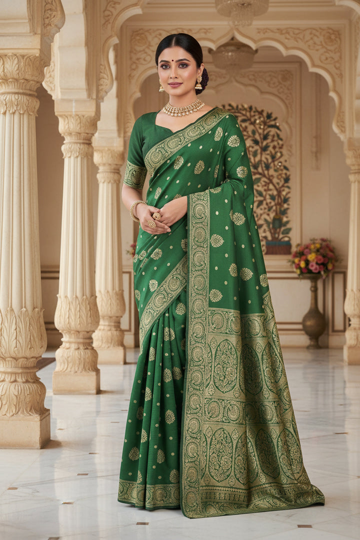 Side profile of model in bottle green Banarasi silk saree showing drape and pallu