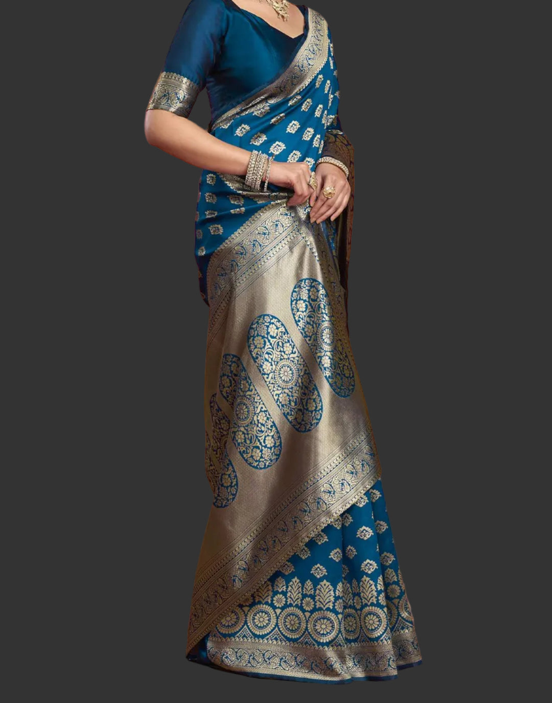 Back view of model in peacock blue Banarasi silk saree showing grand oval medallion pallu
