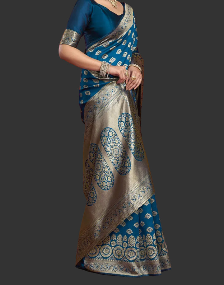 Back view of model in peacock blue Banarasi silk saree showing grand oval medallion pallu