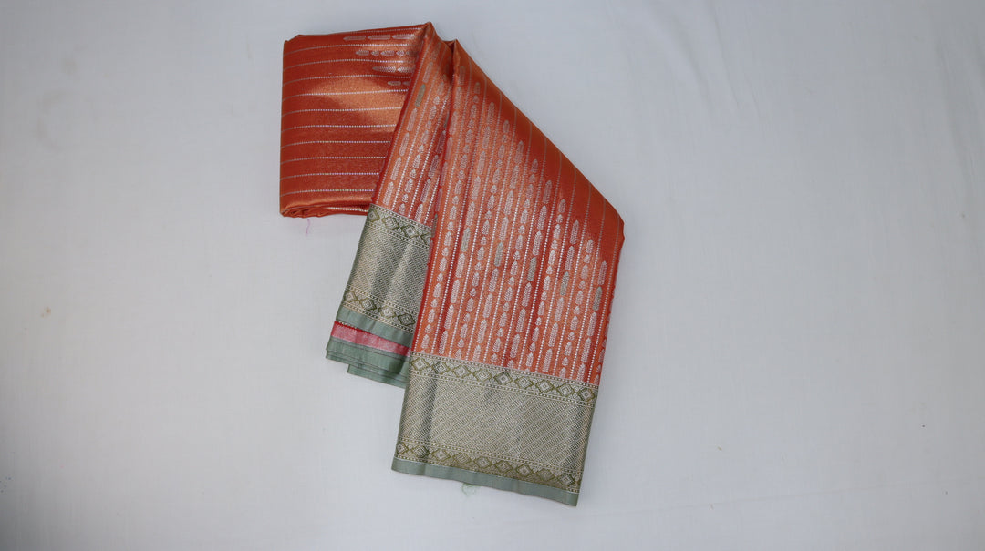 Trendy Pastel Orange Kanjipuram Saree