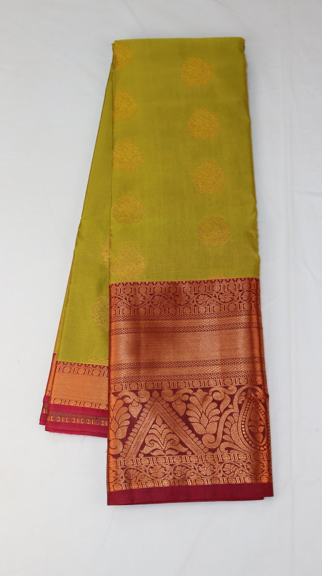 Elegant Olive Green Silk Saree with Zari Buttas
