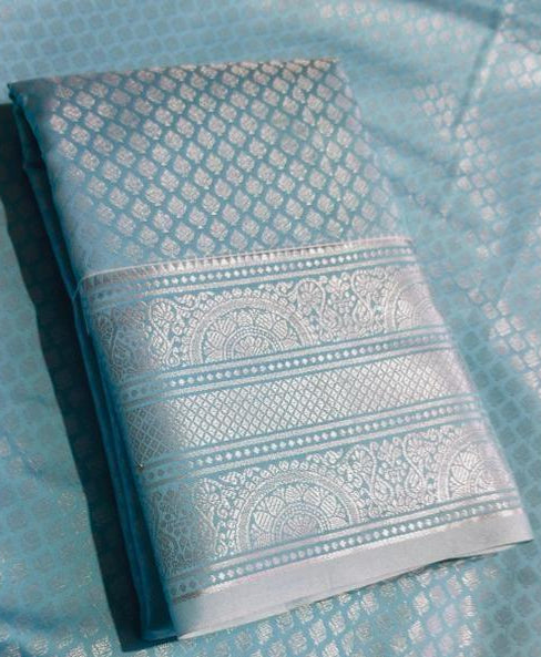 Sky Blue Kanjipuram Silk Saree with Silver Zari Border - Folded view showing diamond brocade body and mandala border