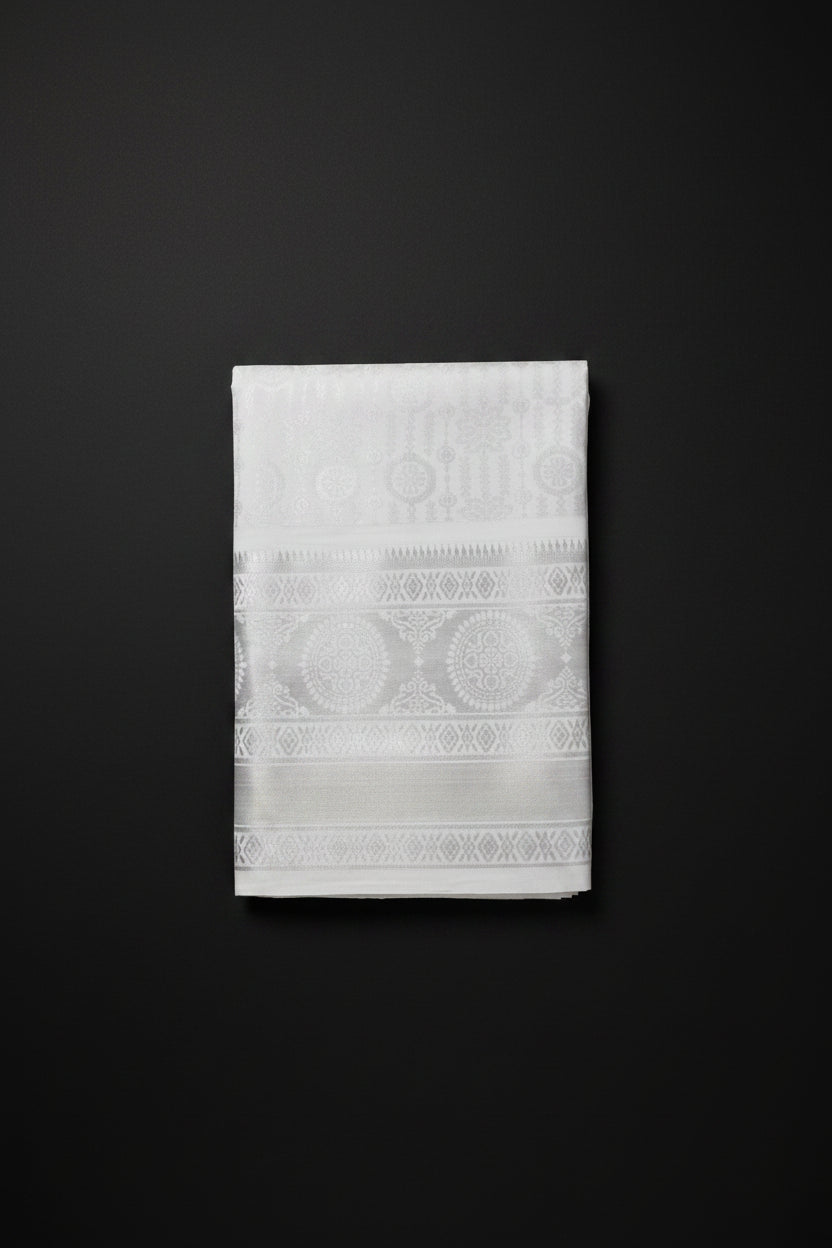 Pure White Kanjipuram Silk Saree with Self Zari Brocade - Folded view showing intricate geometric and floral self-zari weave