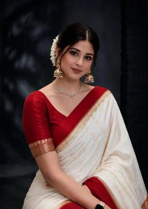 Ivory Saree with Red and Gold Border