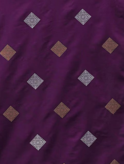 Close-up of grape purple Banarasi silk fabric showing diamond-shaped gold and silver zari buti motifs