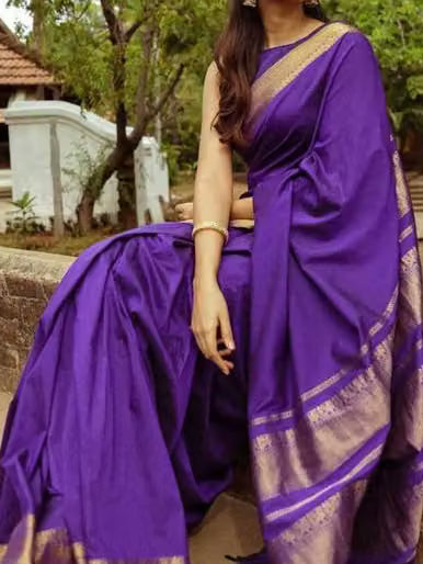Violet Kanjipuram Silk Saree - Full drape seated outdoor view