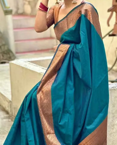 Teal Kanjipuram Silk Saree - Back view showing copper brown blouse and pallu