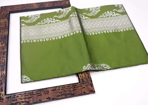 Olive Green Kanjipuram Silk Saree - Folded saree in decorative frame