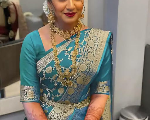 Teal Banarasi Silk Saree - Bridal model wearing saree with gold jewellery