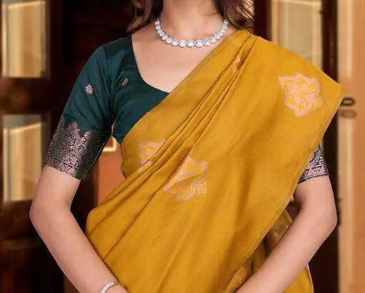 Mustard Silk Saree - Model front view with green zari blouse