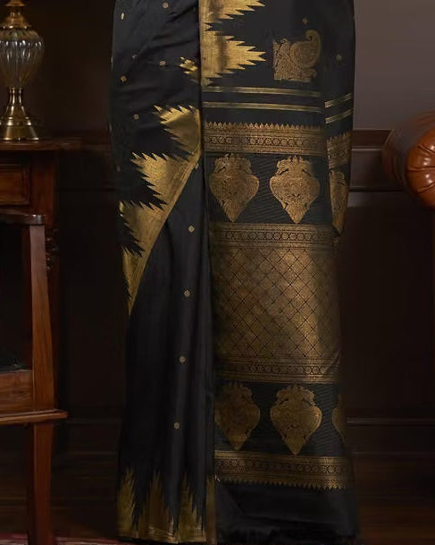 Black Kanjipuram Silk Saree - Close-up of gold zari temple border and medallion motifs