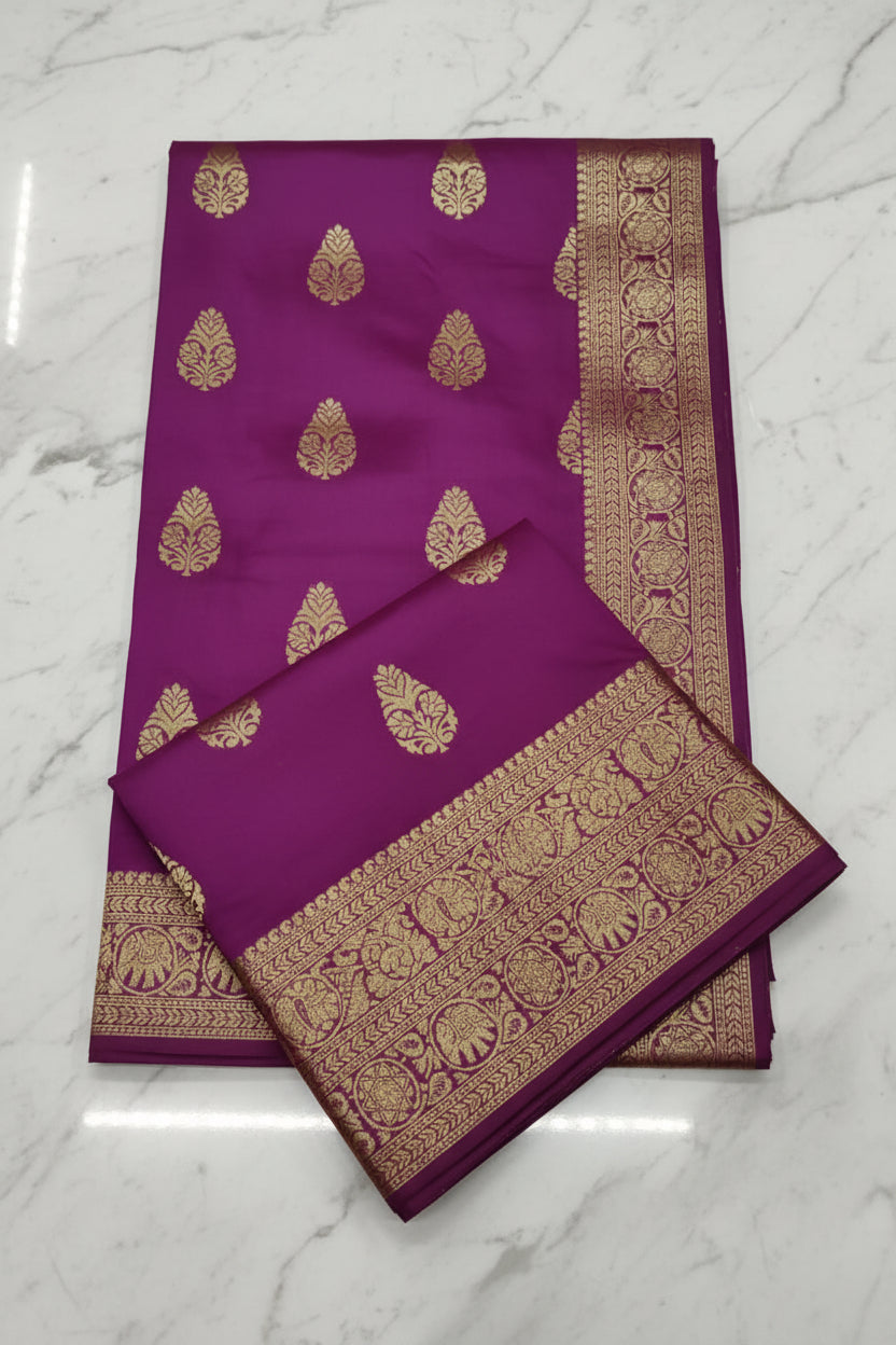 Model wearing Magenta Banarasi Silk Saree