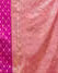 Model wearing magenta Banarasi silk saree - front view