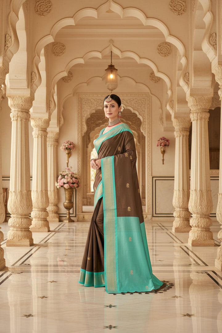 Brown and teal Kanjipuram silk saree flat lay showing full pallu and body