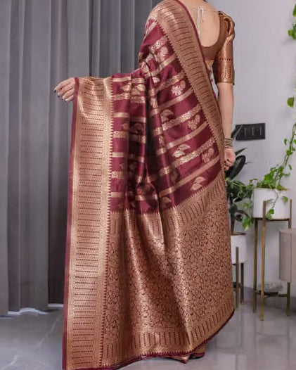 Model wearing maroon Banarasi silk saree - back view showing pallu