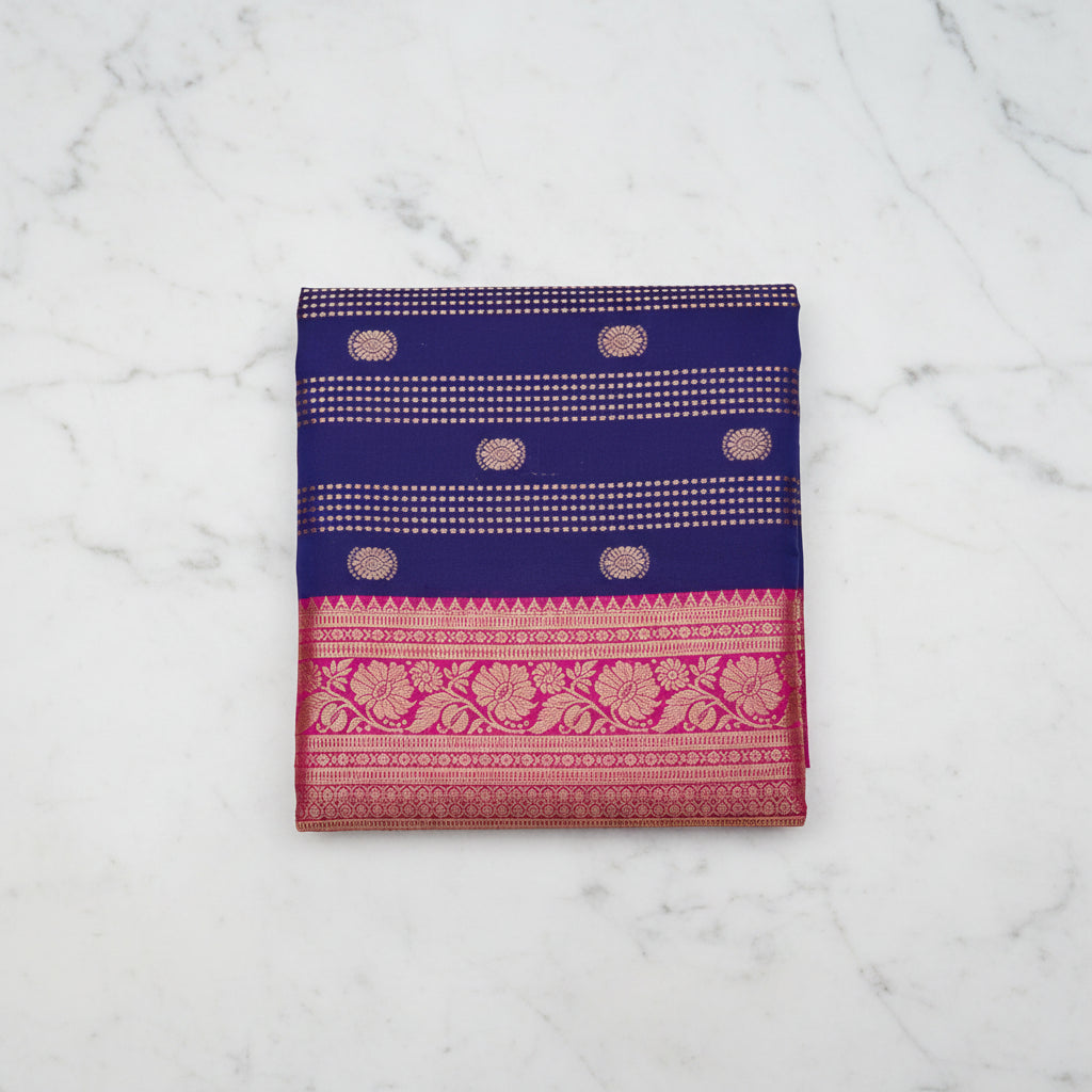 Navy blue Kanjipuram silk saree - full spread showing zari buttas and pink border
