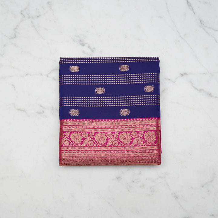 Navy blue Kanjipuram silk saree - full spread showing zari buttas and pink border